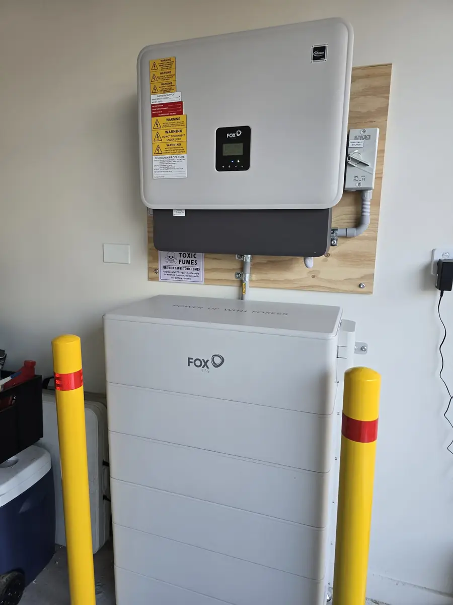FOX battery stack and hybrid inverter installed in a garage